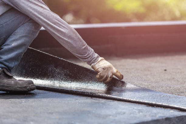Professional Basement Waterproofing technician working in Alamo, IN